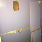 Damage to every wall in the room